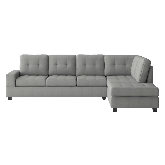 Maston - (3)3-Piece Reversible Sectional with Drop-Down Cup Holders and Storage Ottoman