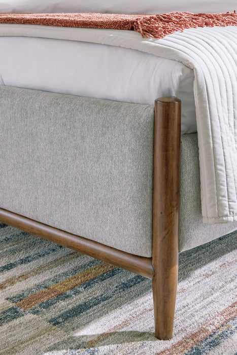 Lyncott California King Upholstered Bed with Mirrored Dresser