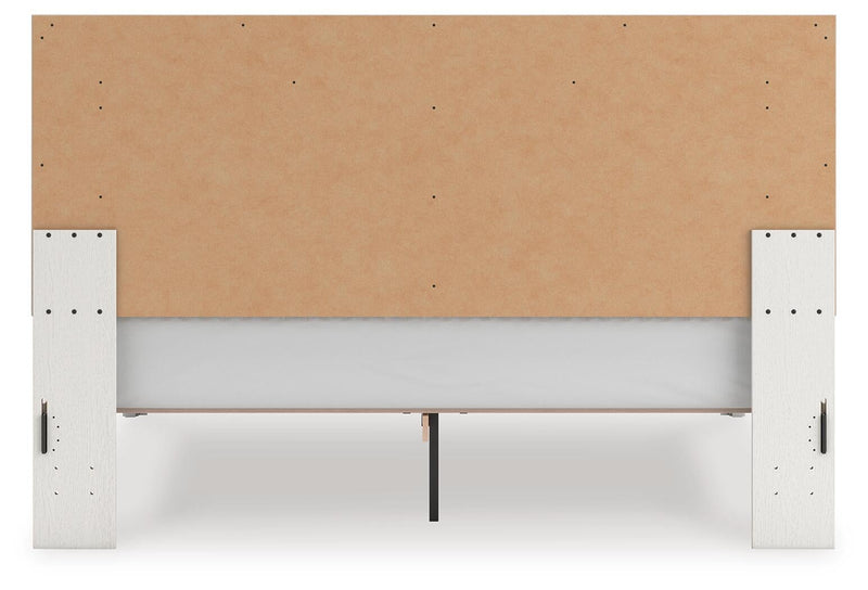 Zuraleus King Upholstered Panel Platform Bed, Dresser, Mirror, Chest and Nightstand
