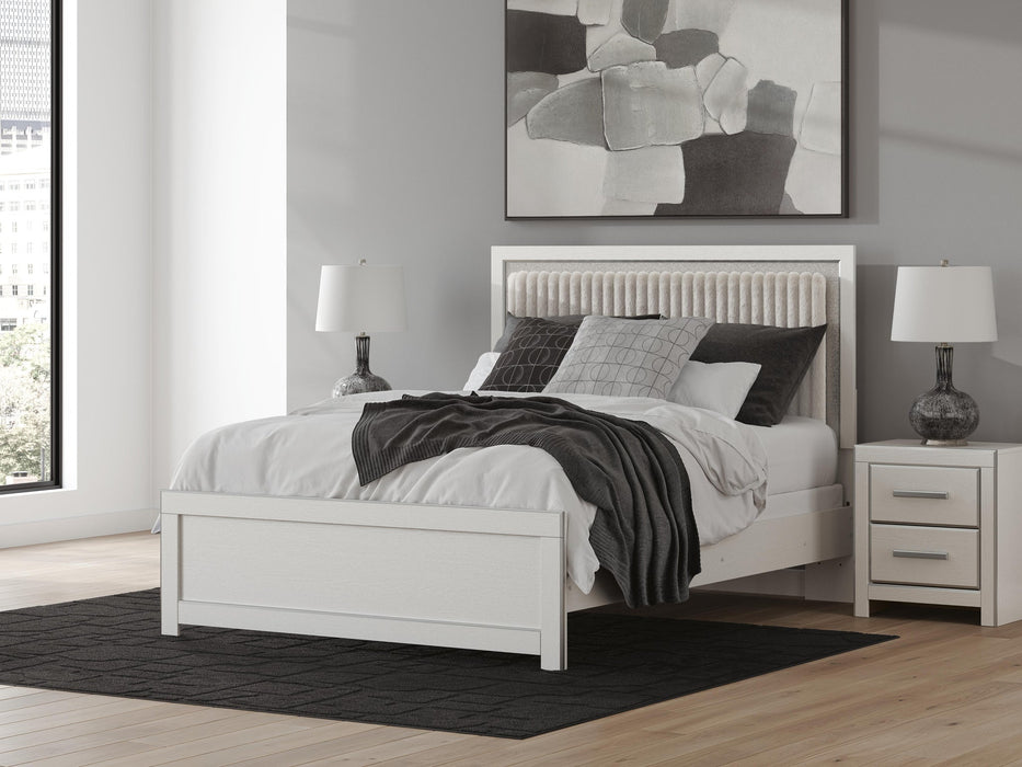 Zuraleus Queen Upholstered Panel Bed, Dresser, Mirror and Nightstand