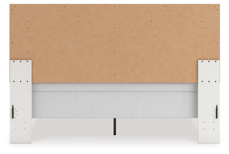 Zuraleus King Upholstered Panel Bed, Dresser, Mirror and Nightstand